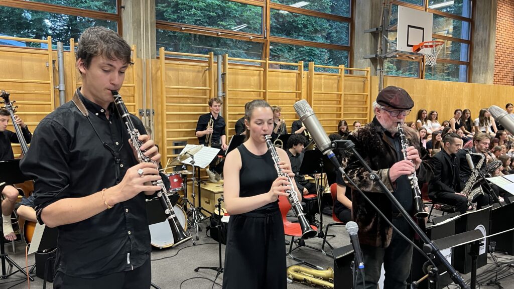On May 28, 2026, the KUG Stage Band, directed by Professor Sigi Feigl, visited GIBS for a special concert together with our students. The evening opened with the KUG Stage Band performing classic big band repertoire, setting the tone for an exciting musical collaboration.
